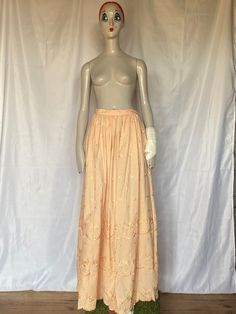 "This gorgeous and full vintage maxi skirt comes in a standout light beach and features embroidery all the way down the skirt . It fastens at the back with a hidden zip and matching peach beach button. Measurements      Waist 26\"     Hips 46\"   Length  40\"  Skirt   84\"    At The Yesterday Society, we pride ourselves on the quality of the grade A vintage items in our collection. All listings are in first class condition unless otherwise stated. Check out these similar items https://etsy.me/3p Floral Embroidered Full Skirt Bottoms, Floral Embroidered Full Skirt For Spring, Spring Floral Embroidered Maxi Skirt, Spring Floor-length Lined Skirt, Flowy Full Skirt With Floral Embroidery, Floral Embroidered Full Skirt For Summer, Summer Floral Embroidered Long Maxi Skirt, Summer Full Skirt With Floral Embroidery, Spring Beach Maxi Skirt Full Length