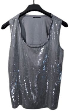 Metallic Sleeveless Tank Top For Party Season, Metallic Tank Top For Summer, Elegant Metallic Tank Top For Summer, Glamorous Silver Party Tank Top, Glamorous Silver Tank Top For Party, Silver Sleeveless Top For Night Out, Silver Tank Top For Summer Party, Silver Sleeveless Tank Top For Night Out, Silver Fitted Tank Top For Party