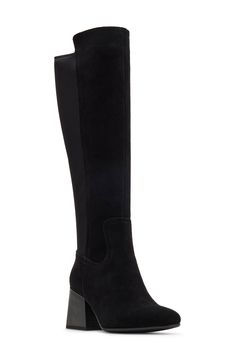 Lofted by a durable sole, this waterproof boot is the perfect choice to elevate your cold-weather ensemble. 2 3/4" heel 10 1/2" shaft; 14" calf circumference Side zip closure Leather and textile upper/synthetic lining/rubber sole Imported Tall Boot, Waterproof Boots, Tall Boots, Boot Shoes Women, Mid Calf, Black Suede, Side Zip, Cold Weather, Knee High