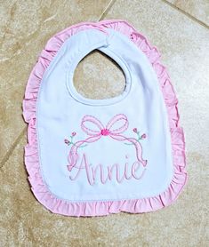 Monogrammed Ruffle Baby Bibs  These super soft 100% cotton bibs are the perfect gift for a baby shower, birthday and for everyday use. A great  gift or accessory to wear any day or time. This listing is for 1 ruffle bib monogrammed with font/design as shown in the listing photos.  Colors: see image above Fonts: see image above These are standard size with a snap closure and unbelievably soft. Please include the following info for each bib in the notes section: 1) initials in monogram order (firs Personalized White Bib For Birthday, Personalized Cotton Bib As Gift, Cute Pink Bib For Gift, Personalized White Birthday Bib, Cute Pink Bib As A Gift, Cute Pink Bib As Gift, Personalized Bib For First Birthday, Pink Cotton Bib As A Gift, Pink Cotton Bib As Gift