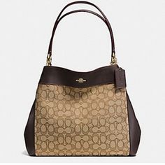 Coach Lexy Shoulder Bag In Signature Expresso Brown & Khaki Jacquard Description Never Use . New With Out Tag Perfect Shape From Smoke Free Home Same Day Shipping Coach Lexy Shoulder Bag In Signature Expresso Brown & Khaki Jacquard Signature Jacquard And Smooth Leather Inside Zip, Cell Phone And Multifunction Pockets Outline Signature Color: Khaki/Brown Gold Hardware Jacquard & Smooth Leather Magnetic Snap Closure Dark Brown Fabric Lining Center Zip Compartment Center Zip Compartment Fabric Lining Handles With 9 1/2" Drop 13" (L) 10 3/4" (H) 5" (W) Style No. F27579 Excellent Condition. Elegant Monogram Canvas Bag For Errands, Bags With Gold-tone Hardware And Monogram Canvas, Monogram Canvas Satchel With Double Handle, Elegant Coated Canvas Shoulder Bag For Errands, Elegant Coated Canvas Satchel For Errands, Bags With Removable Pouch In Coated Canvas, Elegant Coated Canvas Bags, Elegant Coach Shoulder Bag In Coated Canvas, Elegant Coach Coated Canvas Shoulder Bag