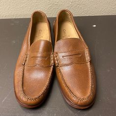 For Sale Is A Pair Of Unworn Cole Haan Penny Loafers In Mens Size 8.5. They Have A Bit Of Storage Marks On The Sole, But Are Essentially Mint Condition. Offers Are Welcome. Thanks For Looking! Casual Wingtip Slip-ons For Business, Casual Wingtip Loafers With Leather Sole, Casual Slip-on Wingtip Loafers, Casual Moccasins With Brogue Detailing For Business Casual, Casual Brogue Moccasins For Business Casual, Casual Wingtip Loafers With Leather Footbed, Casual Plain Toe Moccasins With Brogue Detailing, Casual Slip-ons With Brogue Detailing And Plain Toe, Classic Wingtip Spring Moccasins