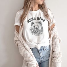 Vintage White Ivory Shade 'Mama Bear' Graphic Screen Printed Bella Canvas Oversized Relaxed Unisex T-Shirt 100% Premium Airlume Combed Cotton Our Boutique Is Filled With A Curated Collection Of Styles: Spell Gypsy Boho Bohemian Hippie Retro Vintage Handmade Coachella Festival Free People Anthropologie Johnny Was Urban Outfitters Western Aztec Tribal Floral Vacation Fall Winter Spring Summer Casual Mumu Cocktail Love Lemons Coat Cowichan Sweaters Cowichan Sweater, Country Girl Shirts, Western Aztec, Western Tee, Western Graphic Tees, Bear Graphic, Bella Canvas Tees, Mama Bear, Mama Shirt