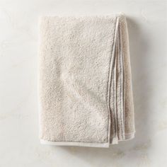 Introducing our most luxurious bath textile collection yet, woven of decadently thick 720-gram organic cotton. Ultra-plush and absorbent sand-colored bath towel coordinates with matching hand towel and washcloth. CB2 exclusive.     100% certified organic cotton  Machine-wash cold; tumble dry  Do not iron or dry-clean  Use only non-chlorine bleach as needed  Made in Turkey Kalani Organic Cotton Sand Solid Bath Towel Tufted King Bed, Natural Interiors, Textile Collection, White Linen Napkins, Black Bath, Natural Interior, Bath Towel Sets, Linen Napkins, Cloth Napkins