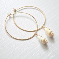 Nassa Shell Hoops, Gold Hammered Hoops, Dangling Shell Hoops Gold Small Hoop Jewelry For The Beach, Gold Hoop Jewelry For Beach, Gold Small Hoop Earrings For The Beach, Adjustable Gold Shell, Shell Dangle Hoop Earrings For Beach, Handmade Gold Hoop Earrings For Beach, Gold Shell With Beachy Style For Vacation, Gold Beachy Shell For Vacation, Handmade Shell Hoop Earrings For Beach