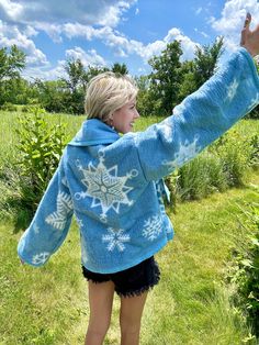 Introducing my latest creation! Reworked a cozy fleece snowflake blanket into the most adorable fleece cardigan. Measurements: Chest: 44" Overall length: 30" Sleeve length: 22" This statement jacket was made with all of my heart, for any human, anywhere, that may be attracted to its vibe! My intention is that the piece will amplify the divine nature of your inner being. ✨🌙 Blue Long Sleeve Fleece Jacket For Winter, Cozy Blue Sweater Coat For Winter, Cozy Blue Outerwear For Winter, Cozy Blue Winter Outerwear, Cozy Winter Fleece Jacket For Loungewear, Cozy Blue Outerwear For Loungewear, Blue Winter Cardigan For Loungewear, Blue Winter Cardigan For Cold Weather, Cozy Blue Outerwear