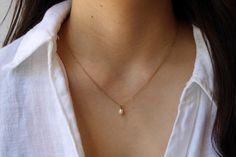 This delicate necklace is just perfect to wear on its own or layered with your favourite pieces! Pearls are also the birthstone of anyone born in the month of June. D E T A I L S *It features a single AA grade cultured white teardrop pearl. These measure between 4 and 5mm and have a smooth, even nacre. *It is suspended from a super dainty  stainless steel chain. Chain is available in 14k gold, rose gold and silver. *Stainless steel is very hard wearing and will not tarnish or oxidise. It is also Rose Gold Necklace With Pearl Pendant For Everyday, Everyday Rose Gold Necklace With Pearl Pendant, White Dainty Birthstone Solitaire Necklace, Dainty White Solitaire Necklace With Birthstone, Simple Pearl Drop Necklace For Everyday, Dainty White Solitaire Necklace For Everyday, White Dainty Drop Necklace For Everyday, Dainty White Drop Necklace For Everyday, Delicate White Solitaire Necklace For Everyday