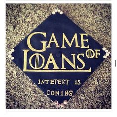 a graduation cap with the words game of loan written on it in gold and black