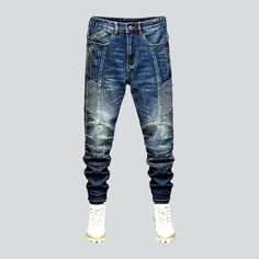 The 2023 Autumn-Winter Collection brings you the ultimate blend of vintage style and modern functionality with these mid-waist smoothed motorcycle jeans. Featuring slim fit silhouettes, medium wash, sanded, whiskered, biker, side-zippers, zipper & button closure, and stretchy fabric, these jeans are the perfect way to make a statement. Dare to be different and make heads turn with this distinctive biker style! Vintage Style: A traditional biker style for those who crave the vintage look. Medium Fitted Denim Blue Washed Cargo Jeans, Straight Leg Winter Jeans, Winter Straight Leg Jeans With Five Pockets, Fitted Distressed Denim Cargo Jeans, Fitted Washed Straight Leg Cargo Jeans, Fitted Straight Leg Washed Cargo Jeans, Urban Style Denim Blue Jeans For Fall, Urban Denim Pants For Winter, Winter Denim Tapered Leg Jeans