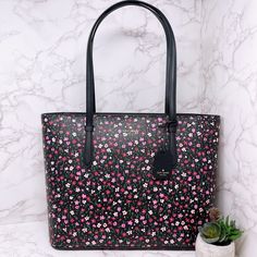 Price Firm Kate Spade Outlet Kate Spade Splendid Ditsy Medium Tote Color : Black Multi Saffiano Pvc Leather Top Zip Closure Interior: 2 Slip Pockets And 1 Zipper Pocket Handle Drop: 10” 15.75”L Measuring Top Of The Zipper Bag 13.5”L Bottom X 5.5”W X 11”H Wool Tote, Kate Spade Disney, Gold Tote Bag, Reversible Tote Bag, Kate Spade Outlet, Bags Kate Spade, Kate Spade Totes, Black Leather Tote Bag, Pink Tote Bags