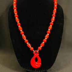 Red Lucite Beaded Necklace w/ Abstract Teardrop Pendant, unsigned beauty; Vintage, from an estate lot of 1970's pieces; Spring ring clasp; Silver tone separator beads, red lucite spherical and cylindrical beads, abstract teardrop shaped red lucite pendant; Dimensions: necklace length 24 inches, pendant height 2.75 inches, pendant width 1.5 inches; Weight: 54.3 grams; Excellent vintage condition; See photos for additional details; Please be conscious that vintage items have lived an earlier life Vintage Red Teardrop Jewelry, Vintage Style Dangling Beads For Gift, Vintage Red Beaded Necklaces With Oval Beads, Unique Red Oval Beaded Necklaces, Unique Red Oval Beads Necklace, Mid-century Red Jewelry For Gift, Unique Red Necklaces With Oval Beads, Vintage Red Jewelry With Dangling Beads, Vintage Red Faceted Beads Jewelry