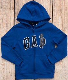 Gap Hoodie Sweatshirt With Adjustable Hood, Gap Hooded Tops With Ribbed Cuffs, Gap Hooded Hoodie For Streetwear, Gap Hoodie With Letter Print For Fall, Gap Sweatshirt With Double-lined Hood For Streetwear, Gap Fleece Sweatshirt For Fall, Gap Hooded Hoodie With Letter Print, Gap Hoodie With Letter Print, Gap Hooded Hoodie For Fall