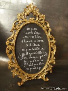 a gold and glittered frame and print - 50th anniversary party decor is featured on pinterest