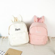 ✦ Production Time: 8-10 business days ✦ Shipping Time: USPS Ground/3-5 business days, USPS Priority/1-3 business days Hop into a world of cuteness and practicality with our adorable Bunny Backpack! This Custom Backpack is perfect for kids and toddlers, combining charm and functionality to make school days and outings extra special. ✦ Perfectly Sized: 9.5''-4.5''-12'' It's spacious enough to hold books, toys, snacks, and everything they need for their adventures. ✦ Vivid Colors: White, Black, Pin Softback Bag For Back To School, Softback School Bag For Back To School, Back To School Softback Bags, Portable Bags As Back To School Gift, Portable Bag As Back To School Gift, Portable Bag As A Back To School Gift, Back To School Gift Backpack, Portable Softback School Bags, Softback Bags For Students End Of School Year