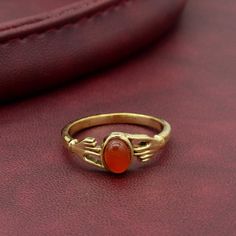 Free Surprise Gift on Purchase of 1 Product. Product :- Ring Material :- Brass Size :- All Size Available  Gold Natural Carnelian Ring,Gemstone Ring, Hand Holding Ring, Carnelian Rings ,Gold Filled Ring, Dainty Ring, Minimalist Ring, Bohemian Ring  * All our products are handmade and we make them as you see in the    photography but because of handmade There may be a slight difference in them * Handling Time: We take handling time of 1-3 Business Day from the date of receipt of the payment * Shi Bohemian Ring, Zierlicher Ring, Carnelian Ring, Ringe Gold, Ring Hand, Gold Filled Ring, Bohemian Rings, Rings Gold, Ring Minimalist