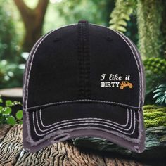 This dad hat is a 100% cotton, soft, and unstructured 6-panel low-fitting hat. One size fits most adults witThis dad hat is a 100% cotton, soft, and unstructured 6-panel low-fitting hat. One size fits most adults with a metal buckle at the back. Gear up for your next adventure with this rugged distressed gray baseball cap, featuring an eye-catching embroidered design of an off-road vehicle and the bold statement 'Born to Ride.' Perfect for 4x4 enthusiasts, this cap is designed to celebrate the thrill of the off-road lifestyle, whether you're hitting the trails or just want to showcase your love for adventure. Crafted from a durable cotton blend, this cap offers both comfort and longevity. The distressed detailing gives it a worn-in, vintage look, making it a stylish choice for everyday wea Distressed Baseball Cap For Outdoor, Distressed Dad Hat For Outdoor, Distressed Snapback Dad Hat For Outdoor, Outdoor Distressed Trucker Hat, Distressed Trucker Hat For Outdoor, Distressed Hats With Curved Brim For Outdoor, Distressed Trucker Baseball Cap For Outdoor, Distressed Snapback Hat For Outdoor, Cotton Trucker Dad Hat For Outdoor