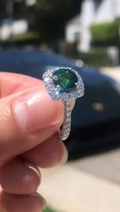 Vivid green is the color of this rich Tsavorite. Set with diamonds in a halo ring, it is the perfect pop of elegance Tsavorite Engagement Ring, Radiant Rings, Radiant Ring, Ring Cuts, Tsavorite Garnet, Wedding Accessories Jewelry, Engagement Inspiration, Ring Ideas, Engagement Ring Cuts