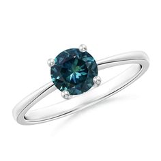 Simple yet elegant, this solitaire Montana sapphire ring in 14k white gold is sure to turn heads. It has a sleek and reverse tapered shank that looks stylish. The round teal sapphire is held in a compass-style prong setting. Teal Montana Sapphire is the Birthstone for the month of September and traditional gemstone gift for 5th & 45th wedding anniversaries. All our items are packaged with care in appealing boxes with plush interiors. Embellished with AAA  Best quality 1 Carat Teal Montana Sapphi Blue Solitaire Emerald Ring In Classic Style, Blue Solitaire Emerald Ring Classic Style, Modern Solitaire Sapphire Ring With Round Band, Modern Round Solitaire Sapphire Ring, Blue Solitaire Emerald Ring, Round Shape, Blue Round Solitaire Emerald Ring, Blue Solitaire Emerald Ring Round Shape, Montana Sapphire Ring, Sapphire Solitaire Ring