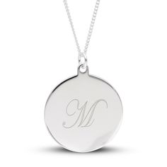 Bring Personalized panache to any look with this simple yet chic engravable disc pendant in silver. Fashioned in sterling silver This small round disc showcases your single initial - inscribed in an artful cursive font at the center. The pendant suspends along an 18.0-inch curb chain that secures with a spring-ring clasp. Classic White Gold Monogram Initial Necklace, Classic Personalized Medallion Jewelry, Formal Round Necklace With Initials, Classic Polished Initial Pendant Jewelry, Gift White Gold Initial Necklace With Polished Finish, Classic Sterling Silver Initials Jewelry, White Gold Initial Necklace With Polished Finish For Gift, Elegant Engraved Circular Jewelry, Classic Sterling Silver Jewelry With Initials