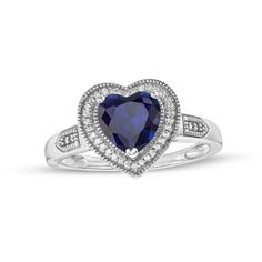 A beautiful reminder of your love, this vintage-inspired heart ring is a look she'll want to wear with everything. Crafted in sterling silver, this choice showcases a 7.0mm heart-shaped bright blue lab-created sapphire embraced by a frame of shimmering diamonds with milgrain borders. Beaded and milgrain-lined details adorn the shank to complete the design. Radiant with 1/20 ct. t.w. of diamonds and a brilliant buffed luster, this ring complements her feminine style. Sapphire Rings, Diamond Frame, Vintage Style Rings, Peoples Jewellers, Heart Wedding, Bright Blue, Feminine Style, Sapphire Ring, Blue Sapphire