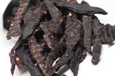 the dried food has been placed in a black bowl