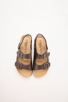 Experience unbeatable comfort and style with the Maibulun double strap slingback footbed sandal. The classic design provides maximum support and stability, making it the perfect choice for all-day wear. The stylish brown adds a touch of classic to any outfit. Upgrade your footwear game with these must-have sandals. 0.59" inch heel Slip-on / buckle closure with secure slingback strap Hard Cushioned footbed Man-made leather upper Man-made lining EVA sole Adjustable Slingback Footbed Sandals With Leather Footbed, Adjustable Slingback Leather Footbed Sandals, Comfortable Leather Slingback Footbed Sandals, Casual Brown Slingback Footbed Sandals, Comfortable Slingback Footbed Sandals With Adjustable Strap, Comfortable Slingback Sandals With Double Adjustable Straps, Brown Double Strap Sport Sandals With Cushioned Footbed, Classic Cushioned Slingback Sandals, Everyday Sandals With Adjustable Straps