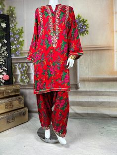 Embrace the vibrant cultural heritage of Sindh with this exquisite kurta salwar set. This kurta and salwar is adorned with intricate tilla embroidery, showcasing delicate gold threads that form traditional motifs. Complementing the tilla work are sparkling mirror embellishments, adding a touch of glamour and shimmer to the ensemble. The dress, crafted from soft, comfortable cotton fabric, provides a perfect balance of tradition and modern elegance. Ideal for festive occasions and cultural celebr Traditional Straight Kurta Palazzo Set With Dabka Work, Traditional Festive Sharara With Printed Motifs, Traditional Palazzo Set For Eid Ceremonies, Festive Sharara With Printed Motifs For Eid, Chanderi Palazzo Set For Eid And Traditional Ceremonies, Eid Sharara With Printed Motifs In Mulmul, Eid Sharara With Printed Motifs, Festive Eid Sharara With Printed Motifs, Transitional Salwar Kameez With Printed Motifs