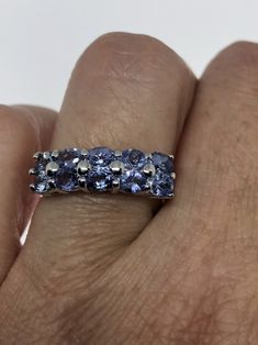 Unusual Deep Toned Tanzanite Sterling Filigree Setting Handmade size 7 or 8 Can be resized My jeweler charges a $10-$20 fee All rings are shipped in a nice gift box. Check out our over a THOUSAND great reviews Engraving is $4 per letter and is not always perfect depending on the piece. It can take a few days if the jeweler is busy. This is payable to Paypal Judithsltd@gmail.com Round Cut Tanzanite Jewelry Gift, Round Tanzanite Jewelry Gift, Blue Round Band Jewelry Gift, Blue Tanzanite Jewelry As A Gift, Blue Tanzanite Jewelry Perfect As A Gift, Blue Stackable Jewelry As Gift, Fine Jewelry Tanzanite Ring For Gift, Tanzanite Round Rings As Gift, Tanzanite Round Ring As A Gift