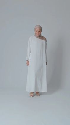 White Kira Maxi Slip Dress with Pockets & Long Sleeve – ANNAH HARIRI Loose Slip Dress, Annah Hariri, Long Sleeve White Dress, Casual Abaya, Modest Maxi Dress, Modest Maxi, White Long Sleeve Dress, Abaya Dress, Modest Wear