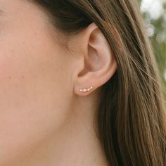 Add a sweet touch to your ear stack with our Pearl Climber Stud Earrings. Choose from gold or silver to effortlessly achieve a delicate look, perfect for everyday wear. Layer them with our Pearl Huggies for a stylish and versatile option. DETAILS stud back measures 12mm long available in gold or silver sterling silver or 14kt gold plated over sterling silver nickel free synthetic pearls Everyday Rose Gold Sterling Silver Ear Climbers, Minimalist Ear Climbers For Gift, Elegant Everyday Ear Climbers, Everyday Rose Gold Ear Cuff, Minimalist Everyday Ear Climbers, Trendy Everyday Ear Climbers, Trendy Hypoallergenic Ear Climbers For Everyday, Trendy Everyday Hypoallergenic Ear Climbers, Elegant Rose Gold Ear Climbers For Everyday