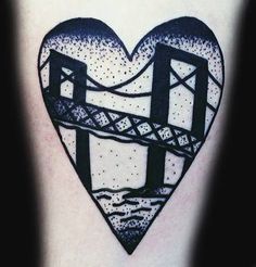 a heart shaped tattoo with a bridge on it