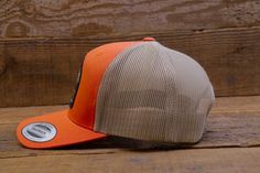 "Snap back Yupoong cap with \"Yosemite National Park\" Patch. One size fits all. Adjustable for hat sizes 6-5/8 to 7-5/8 The front panels are cotton, and the mesh back is polyester. Available in: Moss Green w/ Khaki Mesh Back Brown w/Khaki Mesh Back Orange w/Khaki Mesh Back" Fitted Trucker Snapback Baseball Cap, Fitted Trucker Snapback Hat With Flat Bill, Outdoor Mesh Hat With Flat Brim, Adjustable Outdoor Hat With Mesh Back, Adjustable Mesh Back Hat For Outdoor, Fitted Snapback Trucker Hat, Trucker Sports Hat, 5-panel, Trucker Hat With Flat Brim For Sports, Fitted Trucker Baseball Cap With Flat Brim