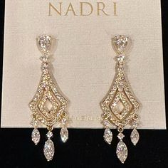 Nadri Cubic Zirconia Crystal Chandelier Earrings 18k Gold Plated 2" Drop Post Backs Rhodium-Plated Or 18k Goldplated Brass; Cubic Zirconia; Crystal Surgical Steel Posts Gold Crystal Drop Earrings, Quince Earrings Gold, Elegant Yellow Gold Chandelier Earrings With Diamond Accents, Elegant Chandelier Earrings With Diamond Cut Cubic Zirconia, Elegant Cubic Zirconia Chandelier Earrings With Diamond Cut, Elegant Diamond Accented Drop Chandelier Earrings, Elegant Diamond Accent Drop Chandelier Earrings, Elegant Diamond Cut Cubic Zirconia Chandelier Earrings, Gold Diamond Chandelier Earrings