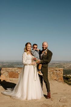 Beautiful Mountain View Wedding in Colorado - Fall Weddings - Autumn Wedding - Budget Savvy Bride - bride and groom holding son Mountain View Wedding, Beautiful Mountain View, Fall Wedding Attire, Mountain View Weddings, Fall Wedding Style, Wedding In Colorado