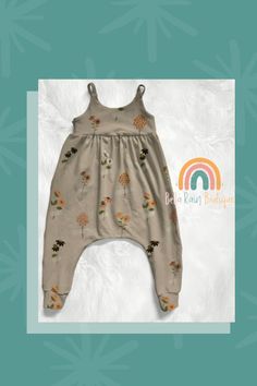 Bring the beauty of fall to your babes wardrobe with our fall floral romper top. Enjoy style with this trendy top with stunning floral details. Treat babe to something special and make every day feel like a bouquet of flowers 🌸 Summer Floral Print Jumpsuits And Rompers For Garden Party, Spring Floral Print Cotton Bubble Romper, Casual Bubble Romper With Floral Print For Spring, Cute Summer Floral Print Bubble Romper, Casual Floral Print Bubble Romper For Spring, Summer Floral Print Jumpsuits And Rompers, Summer Floral Print Overall Jumpsuits And Rompers, Summer Floral Print Jumpsuit Overall, Casual Sleeveless Floral Print Bubble Romper