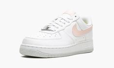 The Women’s Nike Air Force 1 Next Nature “White/Pale Coral” is a warm weather-inspired colorway of the popular lifestyle shoe constructed from at least 20% recycled content by weight.  From Nike’s Move to Zero initiative that aims to reduce the brand’s carbon footprint, the Air Force 1 Low Next Nature in “White/Pale Coral” features a white leather construction with a contrasting Pale Coral leather Swoosh.  Additional pink leather detailing is found on the tongue tag with “Nike Air” branding, and Leather Detailing, Air Force 1 Low, Carbon Footprint, The Vamps, Nike Air Force 1, Pink Leather, Nike Air Force Sneaker, White Nikes, Air Force 1