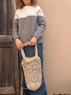 This cute handbag is lightweight and very durable! This bag is great for grocery shopping, shopping at a local farmers market, picnics to the park, and much more! Finish size without the straps is it 14" x 11" without items. It stretches some when items are placed in the bag. After you use it several times and it stretched a little bigger than you like, wash it and dry it and it will return back to its original size. Recommended to air dry but it is machine dryable as well. Eco-friendly Lightweight Crochet Bag For Spring, Natural Hobo Bag For Everyday Spring Use, Eco-friendly Beige Hobo Bag For Spring, Casual Square Crochet Bag, Rectangular Natural Hobo Bag For Spring, Casual Beige Handwoven Hobo Bag, Casual Cream Square Hobo Bag, Casual Natural Hobo Bag For Spring, Brown Crochet Tote Bag For Spring