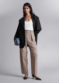 Tailored high-waist trousers featuring a tapered leg, pleated detailing and press creases. • Belt loops• Zip fly with hook and bar closure• Duo slanted side pockets• Duo back welt pockets High-waisted Pants With Hidden Button Closure For Work, Straight Leg Bottoms With Hidden Button Closure For Workwear, Timeless Workwear Bottoms With Welt Pockets, High-waisted Pants With Welt Pockets For Work, Chic Business Bottoms With Belt Loops, Timeless Fall Workwear Bottoms, Timeless Workwear Pants With Welt Pockets, Timeless Workwear Pants With Belt Loops, Timeless Pants With Belt Loops For Workwear