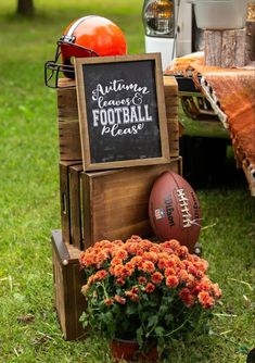 a football themed party with flowers and an old crate