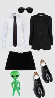 a woman's black skirt, white shirt and suit with alien head on it