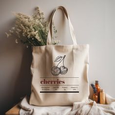 "This 100% cotton bag is perfect for everyday wear. This tote will show off your style in a unique and quirky way. This canvas tote bag is durable and will last for years. The bag features 20\" handles (made from the same canvas), making it easy to carry even with a week's worth of shopping. -100% cotton canvas -Heavy fabric (12 oz/yd² (406.9 g/m -Sewn-in label" Trendy Cotton Bag For Daily Use, Cotton Shoulder Bag With Letter Print, Eco-friendly Cotton Canvas Bag With Letter Print, Trendy Cotton Shoulder Bag Gift, Everyday Cotton Shoulder Bag With Letter Print, Eco-friendly Canvas Tote Bag With Letter Print, Trendy Cotton Canvas Bag For Gifts, Trendy Cotton Canvas Gift Bag, Everyday Cotton Bags With Letter Print