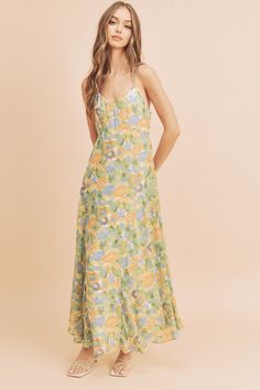 Just as effortless as it is ethereal, this floral Lois dress is featured in an exaggerated skirt, adjustable straps, and invisible zipper on the side for easy wear.Fabric Contents: 100% PolyesterSize Measurement (inch): S: 16.5 (Bust), 14.5 (Waist), 17.5 (Hips), 52.5 (Length) M: 17.0 (Bust), 15.0 (Waist), 18.0 (Hips), 53.0 (Length)