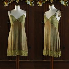 Beautiful silk bronze chemise slip dress! Made by 'Heidi Klum Intimates', size SMALL, Silk, China Sheer lace bodice that has gold threads running throughout that shimmers in the light.  Same gold threaded lace all the way around the hem.   Hand dyed and subtle mottling throughout.   Cute bronze bows at the chest, the back of each strap and on the sides of the hem at the lace. Adjustable spaghetti straps. Shown on a S mannequin with a 34.75" bust, 24.5" waist, 34.75" hips. Best for a woman's SMALL 34 or MEDIUM 36 Condition: great overall. Meant to stretch: 32" bust  31"waist 42" hips 34" length Lace Silk, Women's Nightgowns, Heidi Klum, Lace Bodice, Gold Threads, Sheer Lace, Night Gown, Favorite Outfit, Spaghetti Strap