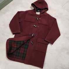 Selling Vintage Vtg The Montgomery Duffle Tibbett Womens Uk 12 Usa 10 Toggle Hooded Wool Blend Plaid Lined Coat Long Jacket. It's Color Is Burgundy. It Has Been In Storage And May Need A Quick Cleaning. You Can See The Condition From The Photos. You Can Get Further Information From Looking At What Is Shown In The Photos. Pricing Low To Sell Fast. I Offer Combined Shipping On Multiple Purchases. All Purchases Should Arrive Within 2 To 9 Days. International Buyers Should Expect Longer Shipping Tim Red Duffle Coat, Double-breasted Wool Coat With Button Closure For Cold Weather, Vintage Red Wool Outerwear, Red Wool Double-breasted Outerwear, Red Fleece Outerwear With Double-lined Hood, Hooded Wool Coat, Do The Right Thing, Duffle Coat, Long Jacket