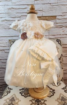 "★Ivory Christening Gown, Baptism Dress★ ★Occasion: Baptism, Child Blessing or any Special Occasion ★Comes With: Dress and Bonnet ★Measurements 6-9 months, (Long 17\") (Waist 19\")   9-12 months, (Long 20\") (Waist 21\")   12-18 months, (Long 21\") (Waist 22\")   18-24 months, (Long 22\") (Waist 23\")   -Waist measurement is around ★Features: The back is open, for comfort when you load the baby (The waist is adjustable, has two ribbons to make a bow, as in the photo) Please check the measurements, and any questions send me a message,  your satisfaction is very important for me Comes with a Dress Bag Dry Clean Only" Elegant Cream Baptism Dress For First Communion, Cream Baptism Dress For Ceremony, Elegant Beige First Communion Dress, Fitted Cream Gown For Pageants, Fitted Cream Gown For Pageant, Elegant Beige Dress For First Communion, Elegant Cream Gown For Pageant, Cream Baptism Dress With Ruffles For Pageant, Cream Ruffled First Communion Dress For Baptism