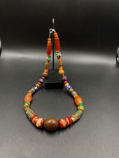 The Beautiful Vintage Antique Necklace Consist Of Glass , Carnelian ,Banded Agate and Cylinder Seal Stamp Beads Probably From 19 Century Unique Old Antique Vintage Jewelry Beads Necklace Multicolor Carnelian Hand-strung Jewelry, Handmade Multicolor Carnelian Beads, Gems, And Cabochons, Artisan Multicolor Carnelian Necklace, Multicolor Carnelian Jewelry With Large Beads, Traditional Agate Necklace With Colorful Beads, Traditional Agate Necklaces With Colorful Beads, Multicolor Carnelian Beaded Necklace With Large Beads, Multicolor Carnelian Necklaces With Polished Beads, Multicolor Carnelian Beaded Necklaces With Large Beads