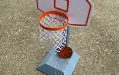 a basketball and hoop on the ground