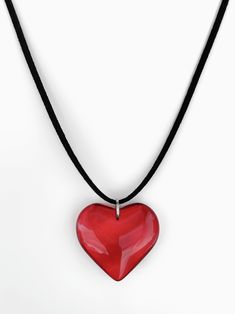 The necklace guaranteed to make your heart skip a beat - prepare to fall in love! Meet the limited edition 'FIRST DATE' suede wrap choker - featuring a large red heart pendant strung alongside faux black suede leather, this piece will easily make a statement with any look! ♥ Made with a large red glass heart pendant and faux black suede leather cord ♥ 55" length - designed to allow you to tie this piece in multiple ways Handmade with love in Los Angeles. Evil Eye Necklace Silver, Big Heart Necklace, Red Heart Pendant, Heart Pendants, Blue Evil Eye, Evil Eye Necklace, Glass Heart, First Date, Eye Necklace