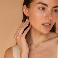 It’s as easy as pie to throw on our Pearl Threader Earrings and put an outfit together. Glamorous and dainty, these dangling charm earrings are minimalistic and perfectly stack with other earrings in your collection. Material: High Quality Solid 925 Sterling Silver Finish: 18K Gold ∙ Sterling Silver Featuring ~0.7mm Thick Chain Earrings ~60mm in Length, with a ~5.5x4.5mm Pearl Charm Sold as a pair Part of our Pearl Collection Model showcases a glamorous, event-ready look featuring Pearl Station Necklace With Matching Earrings For Everyday Use, Everyday Teardrop Pearl Charm Jewelry, Minimalist Dangle Threader Earrings, Minimalist Gold Plated Teardrop Earrings, Everyday Minimalist Pearl Drop Teardrop Earrings, Everyday Long Drop Pearl Charm Jewelry, Everyday Elegance Teardrop Jewelry With Matching Earrings, Fine Jewelry Dangle Earrings With Delicate Chain, Minimalist Dangle Pearl Earrings