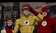 the flash and two other superheros standing in front of a city